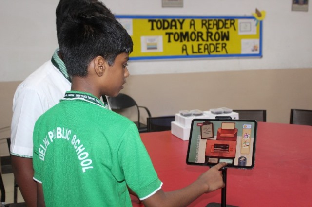 Student using tablet / digital game