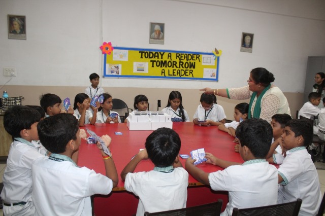 Group card-based activity with teacher