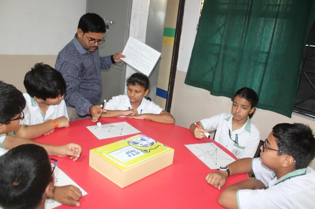 Students drawing shapes / geometry puzzle
